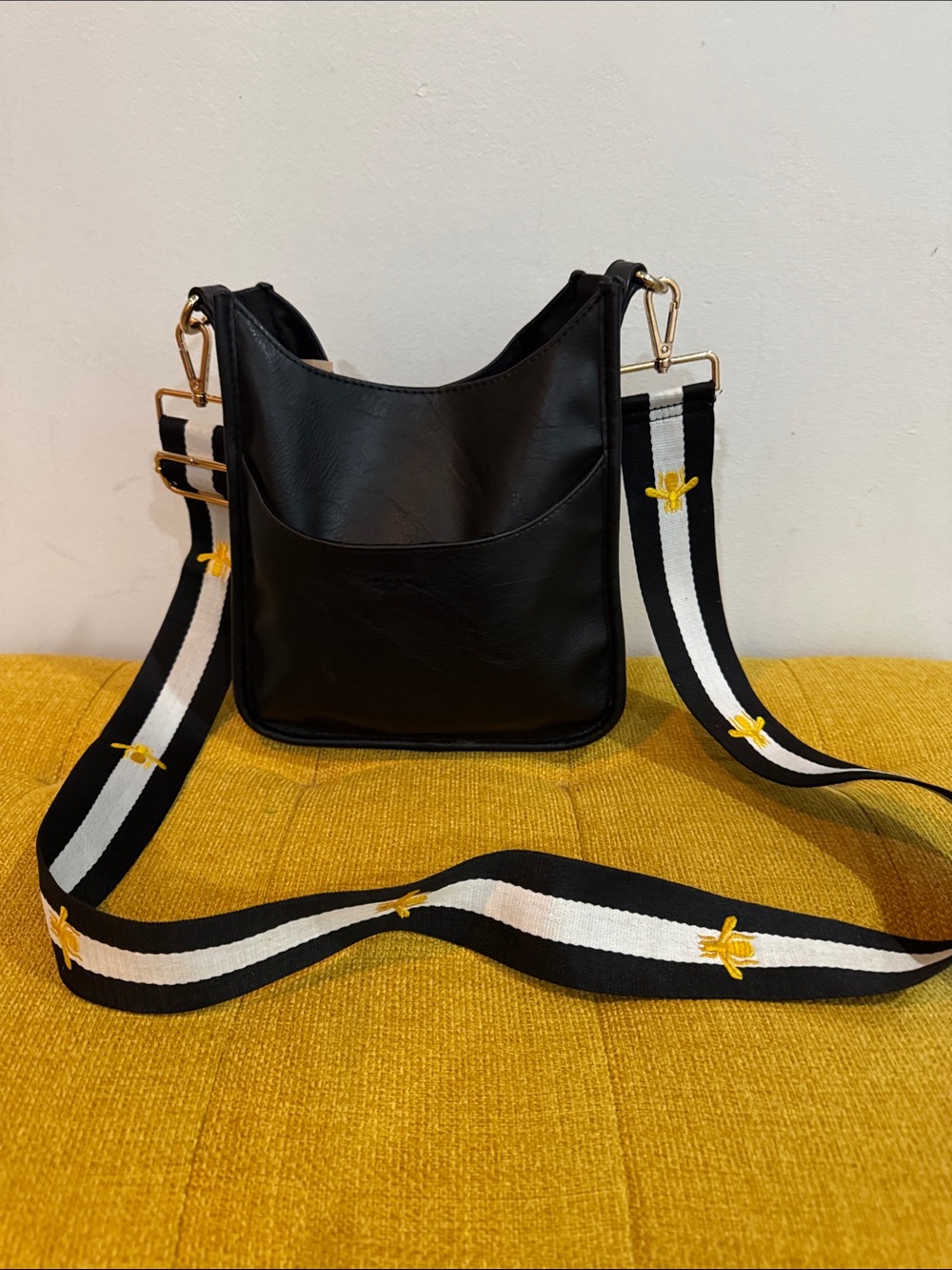 Black Leather Crossbody Bag with Decorative Bee-Embroidered Strap
